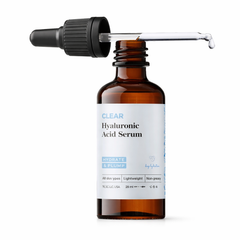 Brown glass serum bottle with dropper labeled 'Hyaluronic Acid Serum